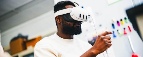 Doctoral student Kwame Owusu-Nyantakyi working in the Burger Lab.